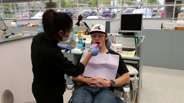 Tina Kingra works with Cougars forward Lance Yaremchuk