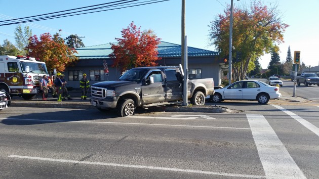 Two car collision at 5th & Carney - photo 250 News