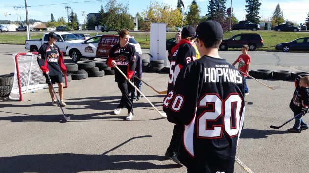 PG Cougars and fans play street hockey - photo 250 News