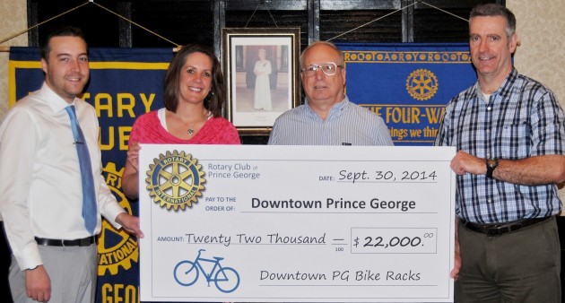 l-r Ross Birchall, – Rotary Club of P.G.; Carla Johnston and Rod Holmes, Downtown P.G.; Pat Cotter, President – Rotary Club of P.G.