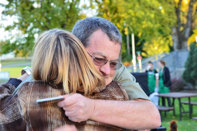 Doug Leslie and Tracey Matters exchange a supportive hug