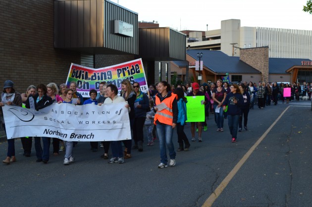 Take Back the Night march heads up 7th Avenue from City Hall