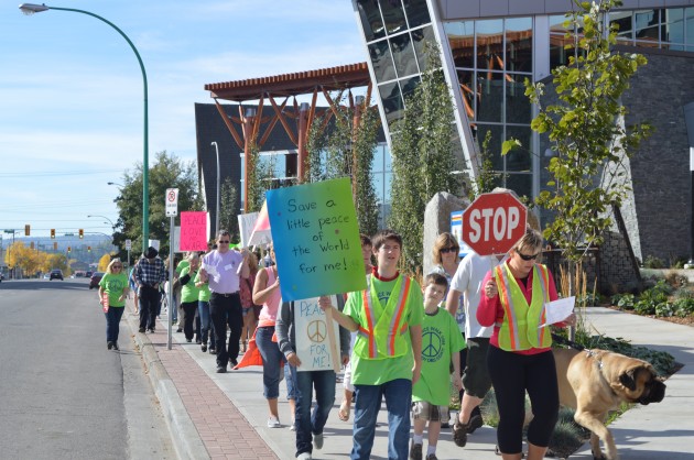 Peace walk proceeds along Victoria Street Sunday morning. Photos - 250 News