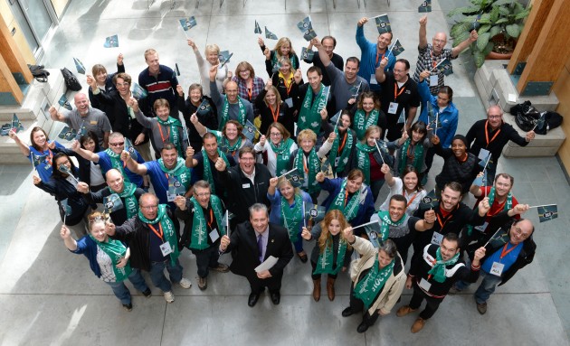 Reps from UNBC, the 2015 Canada Winter Games including visiting Chefs de Mission celebrate the tuition news -photo UNBC