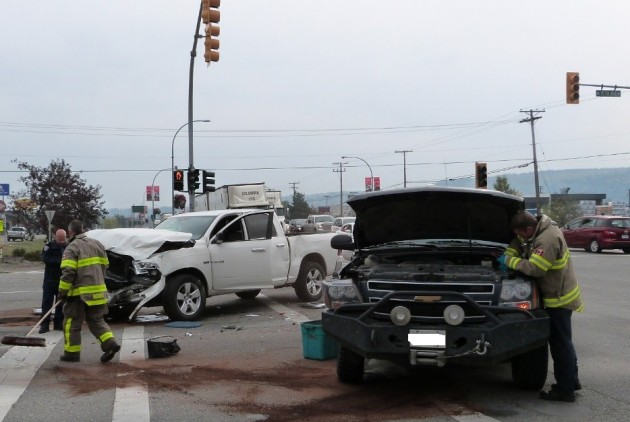 Vehicles block intersection of 15th and Central - photo 250News