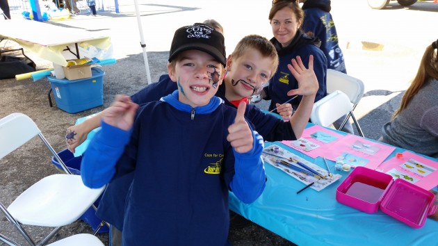 Adam & Braden Flett have their faces painted at today's Jail & Bail - photo 250 News
