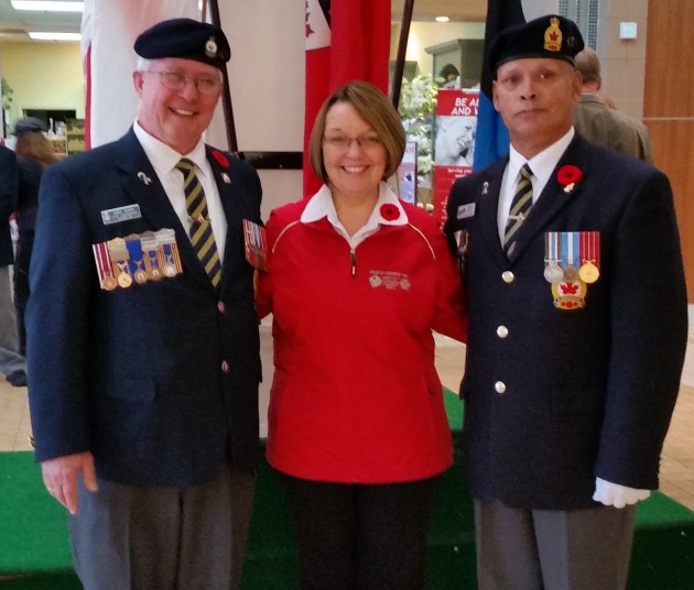 Legion Branch 43's John Scott and Bruce Gabriel join MLA Shirley Bond in launching the poppy campaign in Prince George-photo 250News