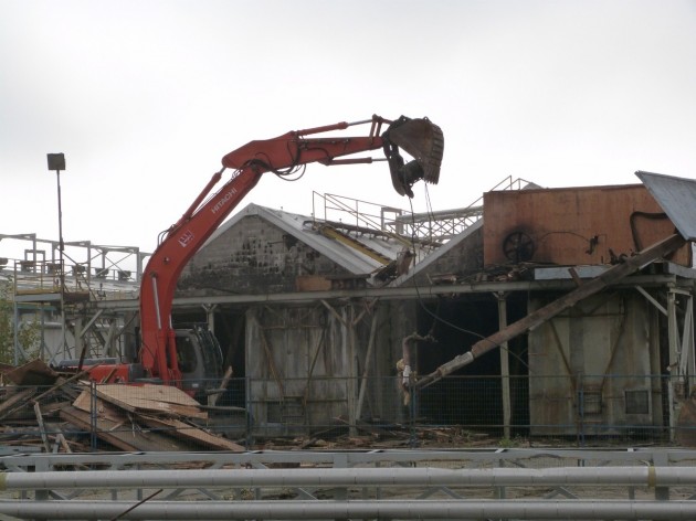 Excavator takes a bite out of buildings - photo 250News