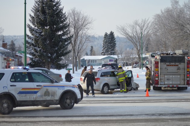 Emergency crews at accident scene at Ospika and Trader Crescent Sunday. Photos 250News