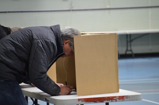 Lyn Hall selects his choices at Malaspina Elementary this morning. Photo 250News