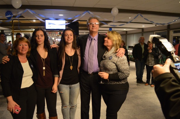 Campaign manager Michelle Marrelli and Hall family await victory confirmation. Photo 250News