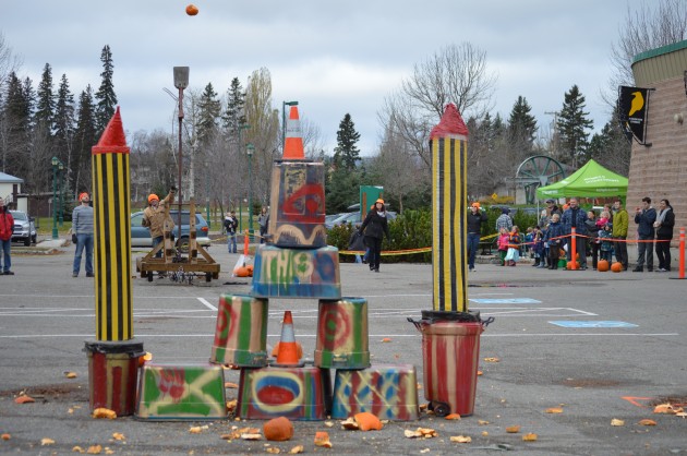 Old and young enjoy smashing pumpkins Saturday. Photos 250News