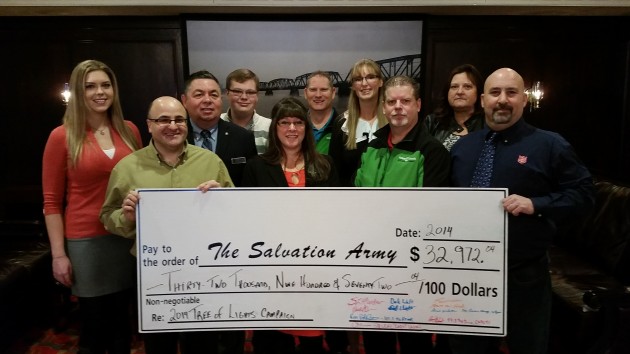Tree of Lights Committee holds cheque - photo 250News