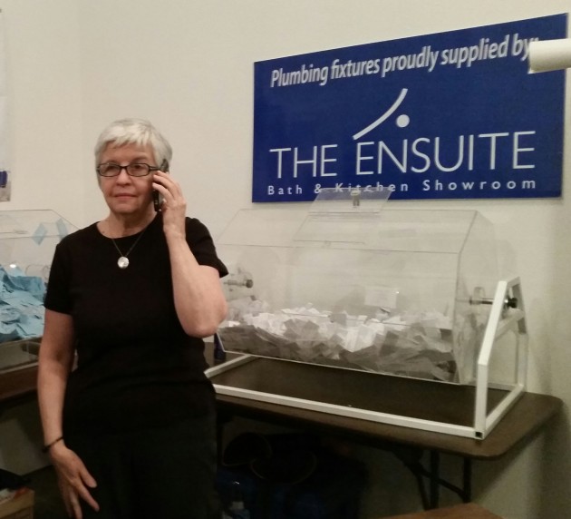 Donalda Carson, executive director, P.G. Hospice Society, selects the winning ticket - photo 250News