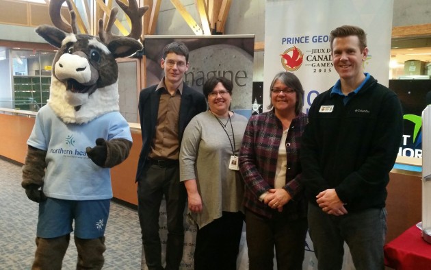 Photo from left: Spirit the caribou, Peter Stevenson, PG Cycling Club, Anne Chisholm, health service administrator, Northern Health, Dr. Sandra Allison, chief medical officer, Northern Health, Mike Davis, director of marketing and communications, Canada Winter Games - photo 250News
