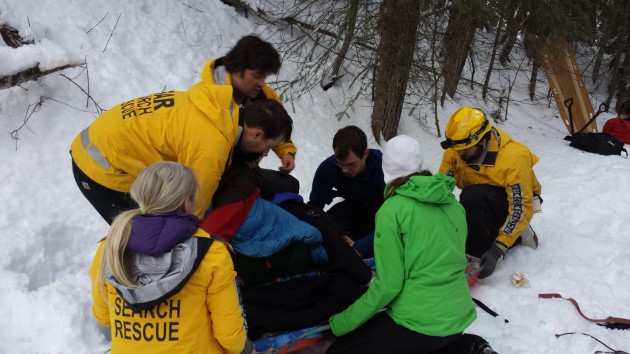 Members of Prince George Search and Rescue tend to an injured skier on Tabor Mountain. –Photo Credit: Lauren Phillips