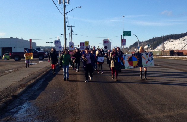 Protest march proceeds along First Avenue on Saturday.