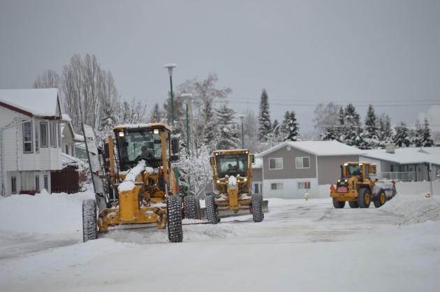 City workers and contractors clearing streets today. Photo 250 News