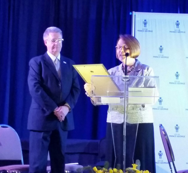 MLA Shirley Bond presents Mayor Lyn Hall with a letter from the Premier congratulating Prince George on its 100th birthday - photo 250News