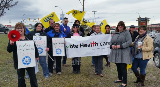 Union members rallying just off Highway 97 and 15th Avenue Tuesday - photo 250 News