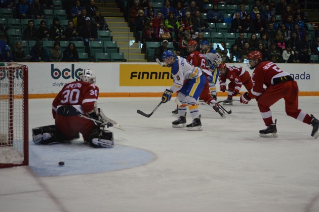 Shot by Alberta's Jaret Anderson-Dolan slides wide of Ontario net in second period action. Photos 250 News
