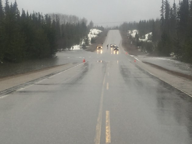 Water flows across Highway 97 north of Bear Lake. Submitted photo