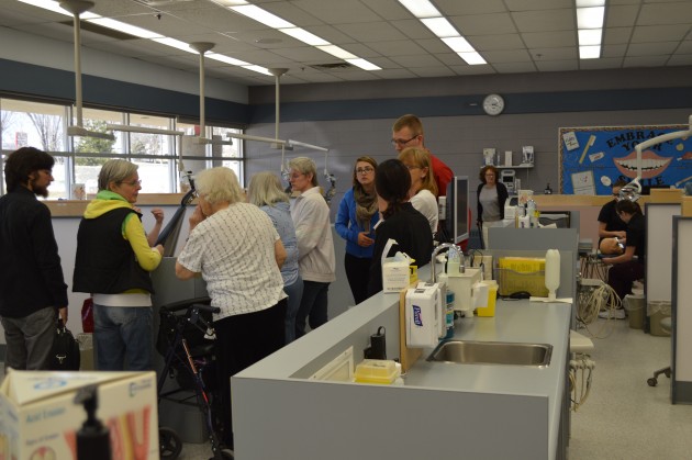 The public was invited to look at what might be cut at CNC. Photo 250News