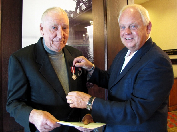 Ben Meisner receives Queen's Diamond Jubilee Medal from Cariboo-Prince George MP Dick Harris in 2013. Photo 250News archive