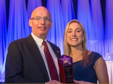 President of NMP Trust, Vanderhoof Mayor Gerry Thiessen, presents award to Christine Kennedy photo courtesy UNBC