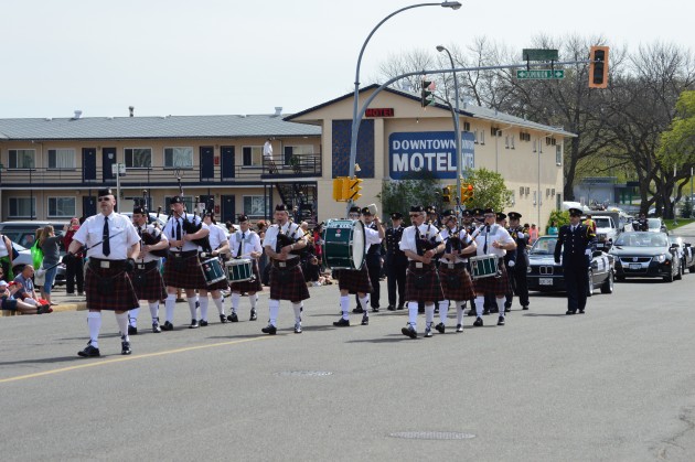 Community Pipe Band leads May Day parade up 7th Avenue Saturday. 250News photo