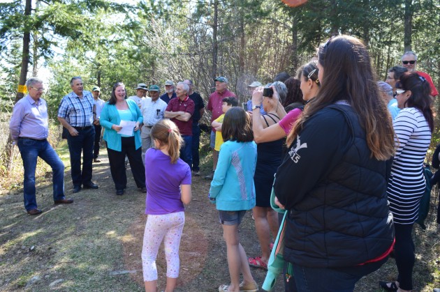 Kary Michaels thanks those who attended trail dedication to her father Bob Graham. Photos 250News