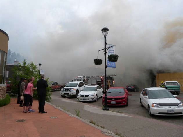 PG Mayor Lyn Hall and others watch Friday's fire - photos 250 News