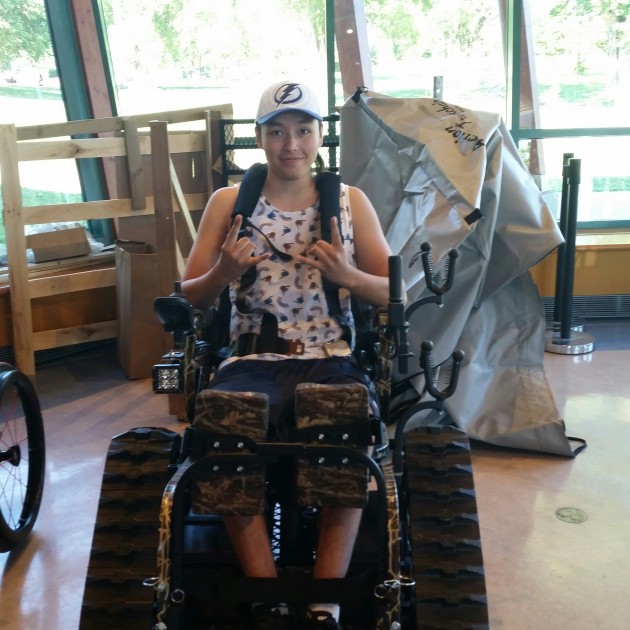 Trent Seymour in his new all-terrain wheelchair - photos 250 News