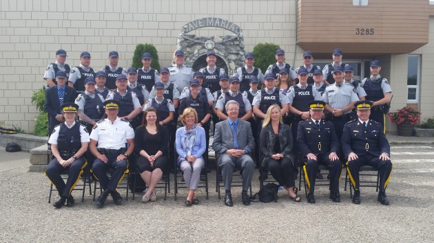 Members of Alexa's Team and dignitaries pose in front of Immaculate Conception School Wednesday - Photos 250 News