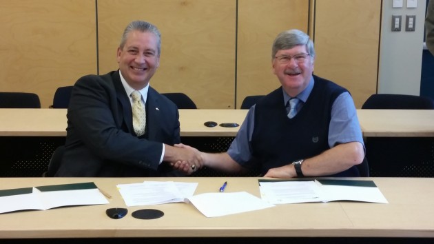 From left, UNBC President Dr. Daniel Weeks and PG School Board Chair Tony Cable - photo 250 News