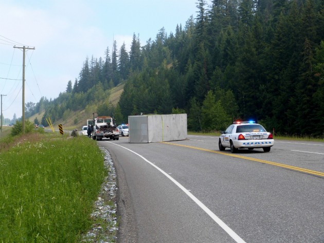 Trailer lies on its side following accident on Foothills Boulevard. Photos 250 News