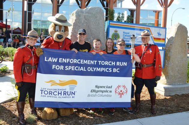 Participants join RCMP at Law Enforcement Torch Run celebration. Photo courtesy RCMP