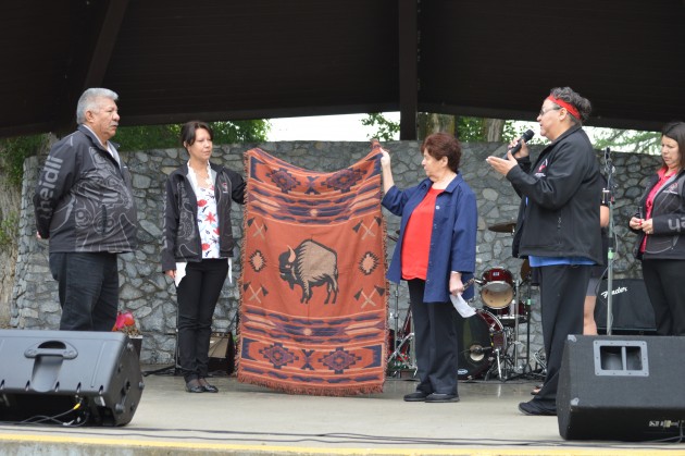 Chief Dominic Frederick is honoured with a blanket "as a reminder of a great day" Photos 250News