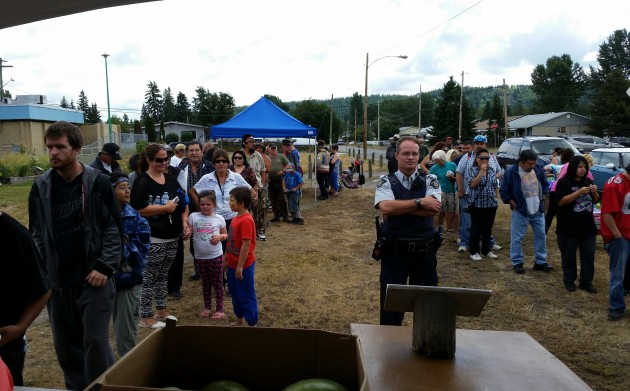 Dozens line up for free hot dogs