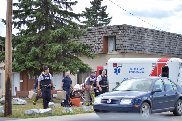 Victim of vehicle-pedestrian collision at 20th and Central placed in ambulance. Photo 250News