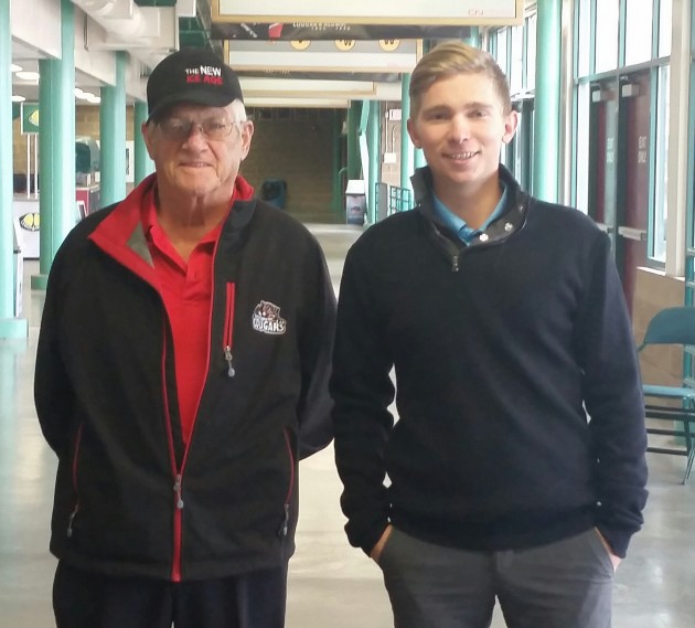 From left, Prince George Cougars volunteer "Super" Dave Henley and Cougars games operations and promotions manager Braydon Ouellete - photo 250 News