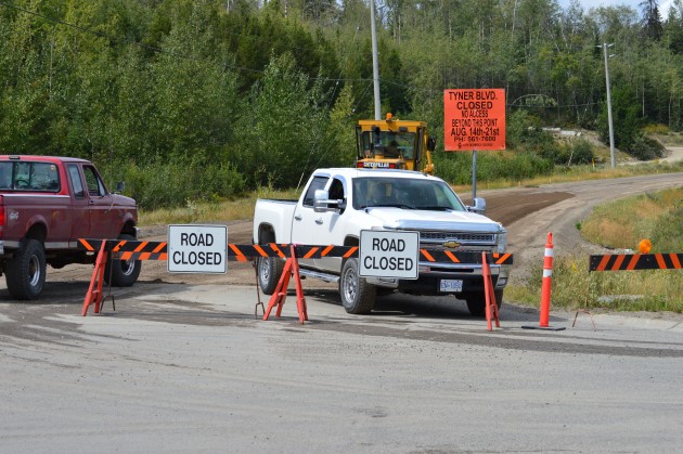 Workers were on the job Sunday at Tyner and University Heights. Photos 250News