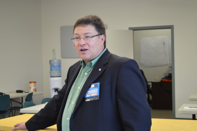 Independent Sheldon Clare answers questions at campaign office opening. Photo 250News