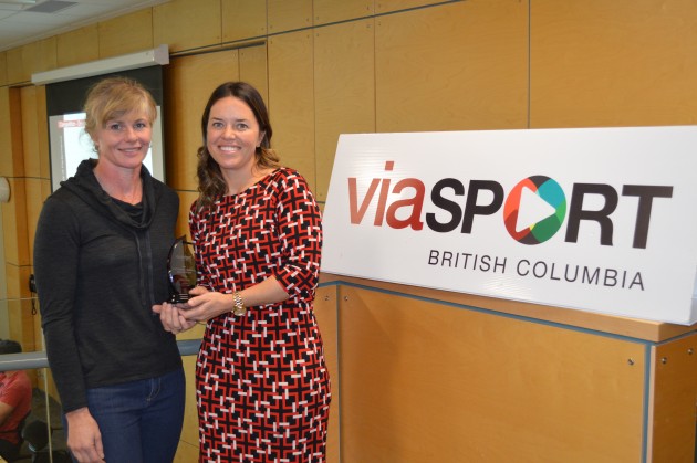 Nicole Ebert (l) receives Coach of the Year award from ViaSport's Alyson Gourley-Cramer. Photo 250News