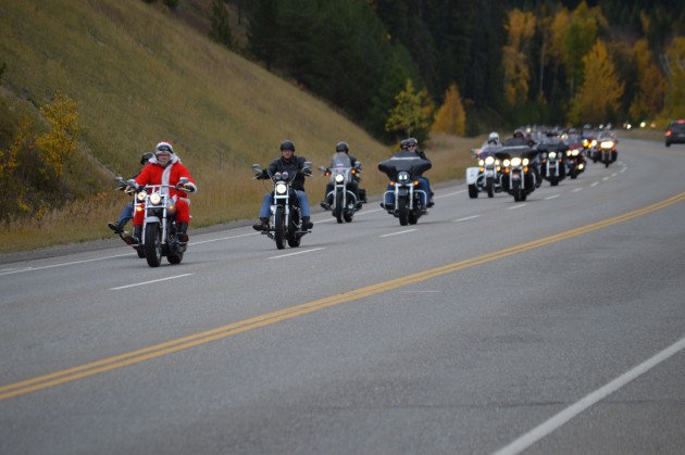 Who else but Santa leads the Toy Run up Foothills to the Hart Sunday. Photos 250News