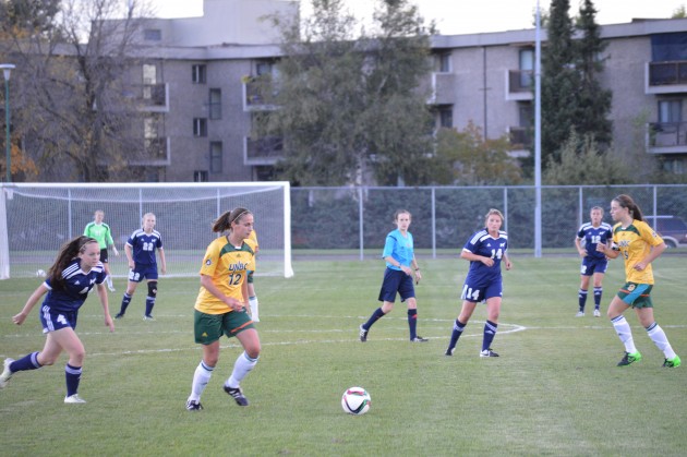 Action during Friday night's UNBC - UBCO Canada West soccer game. Photo 250 News