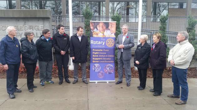 Rotarians, including Prince George Mayor Lyn Hall, gather outside city hall - photo 250News