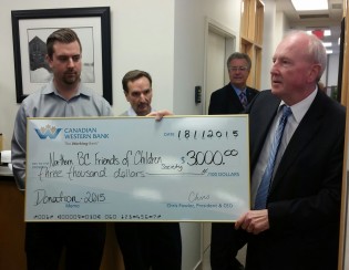From left, Matthew Dawes and Kelly Sharp of Friends of Children and Greg Sprung, CWB's Executive Vice President of Banking