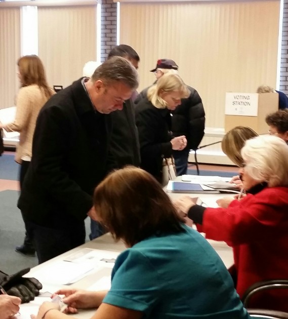 Don Zurowski prepares to vote at CityHall - photo 250 News