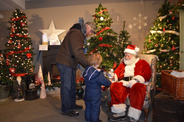Santa on hand at Celebration of Lights to greet youngsters. Photos 250News